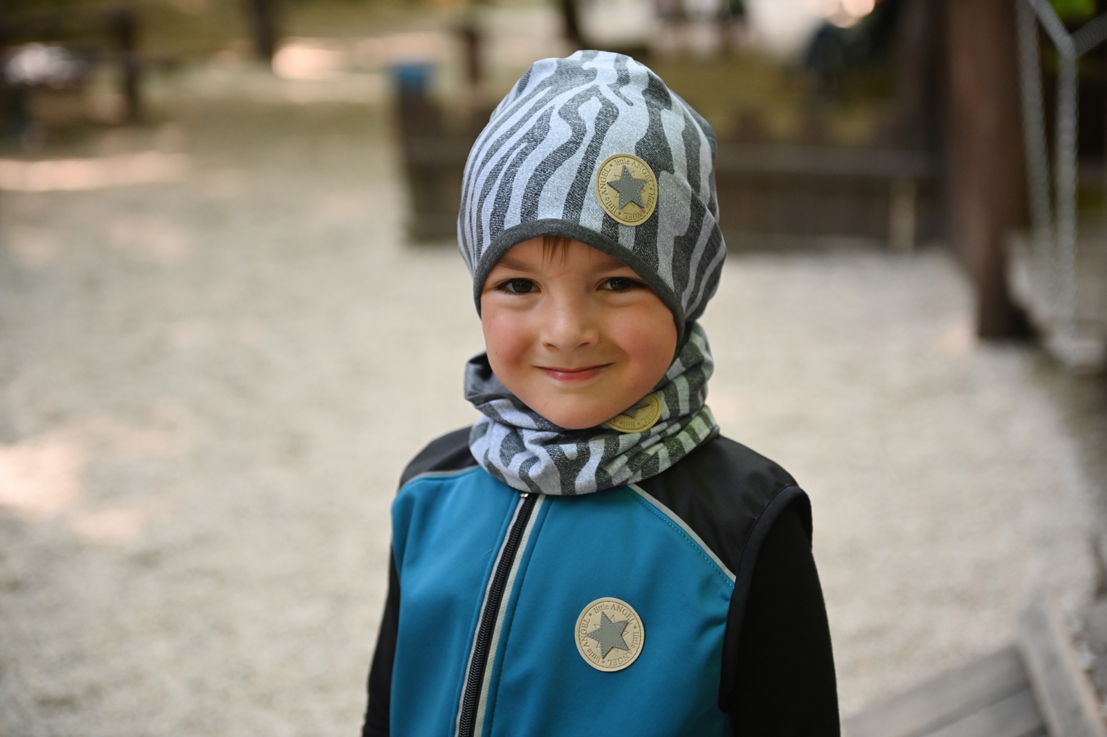 Čepice podšitá Outlast® - šedočerný vzor/tm.šedý melír 3 | 42-44 cm