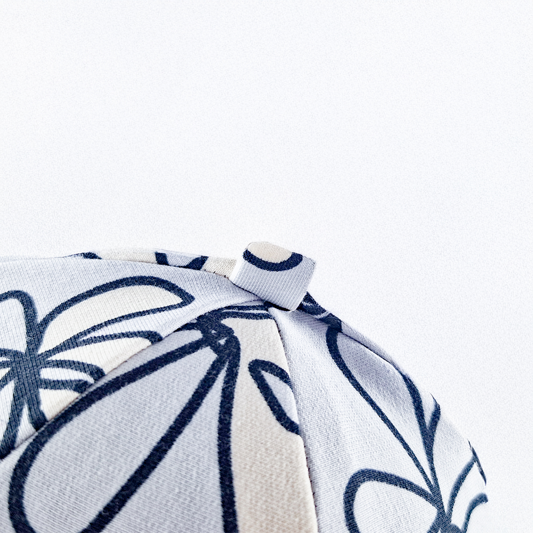 Čepice podšitá Outlast® - sv.šedá kytky/šedý melír 7 | 58-62 cm